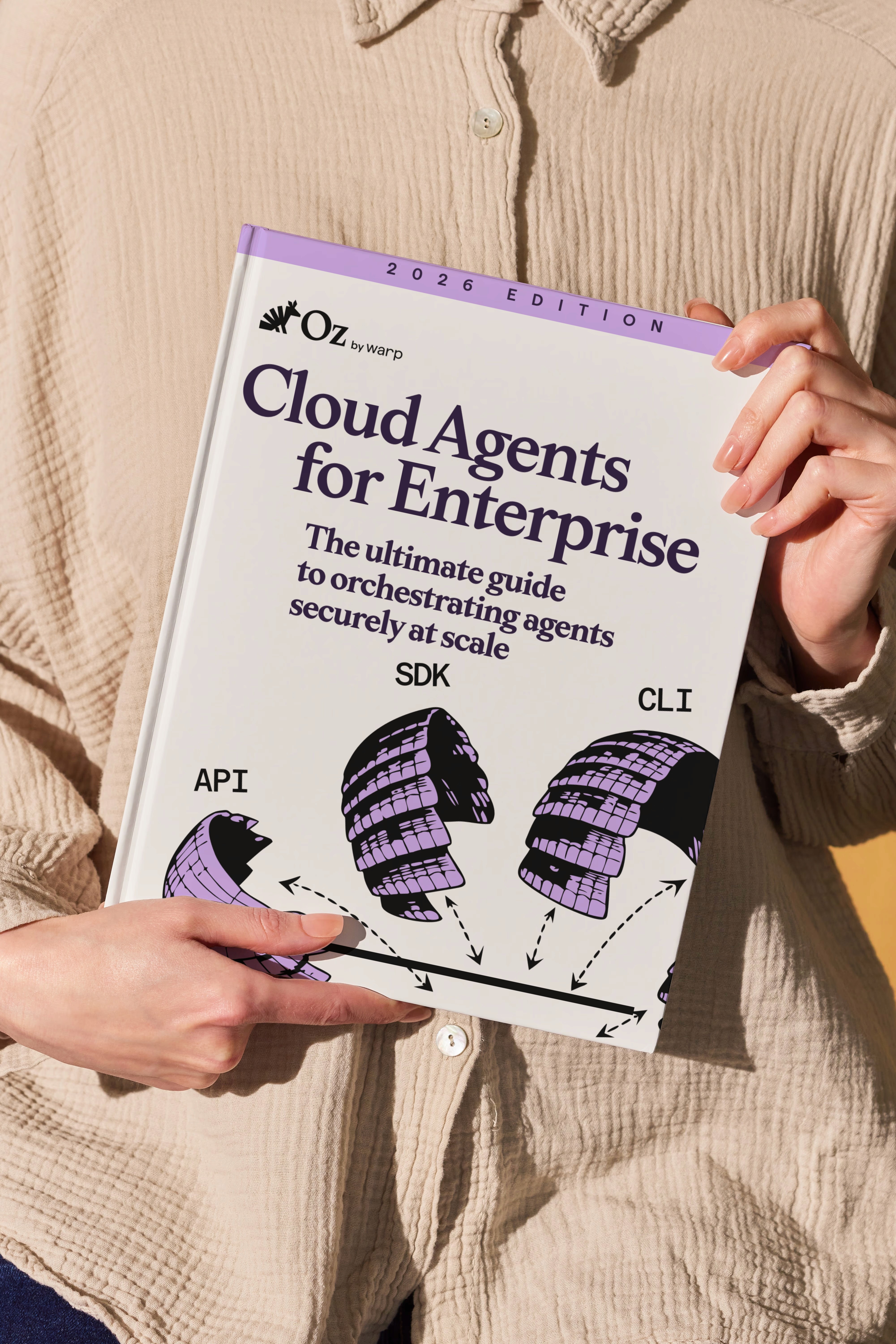 Warp team retreat in a conference room with a presentation screen showing "Warp's Voice & Vision" and attendees smiling at the camera.